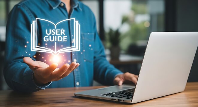A man using a laptop with a user guide icon above his hand.
