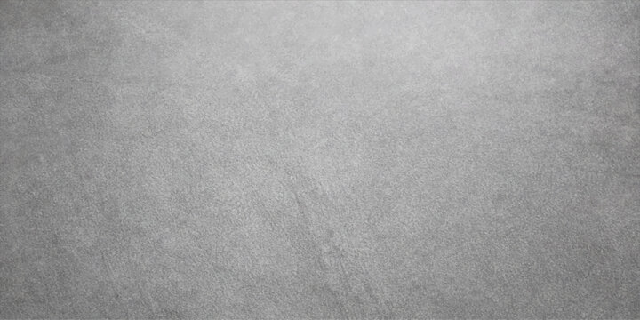 Brushed metal texture background features a gray textured surface with a light grunge pattern on a blank vintage material backdrop