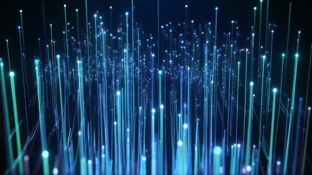 Glowing fiber optic strands emit radiant blue, cyan, and green light against darkness, symbolizing digital connectivity, high‑speed communication, and futuristic data transmission networks.