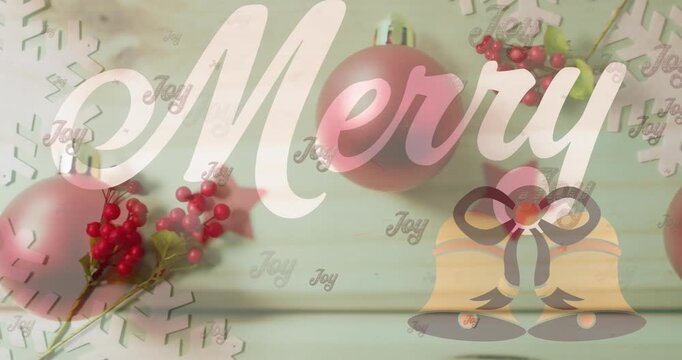 Animation of merry text over christmas baubles
