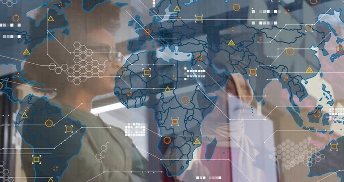 Two women collaborating on glass board in business meeting, showing world map overlay, hex grid