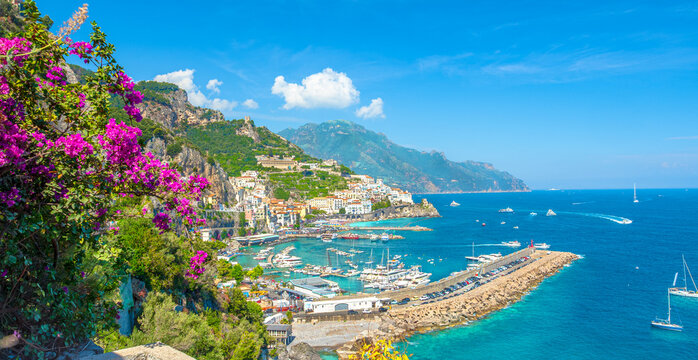 Amalfi coast Positano town view with colorful bougainvillea flowers blooming in springtime