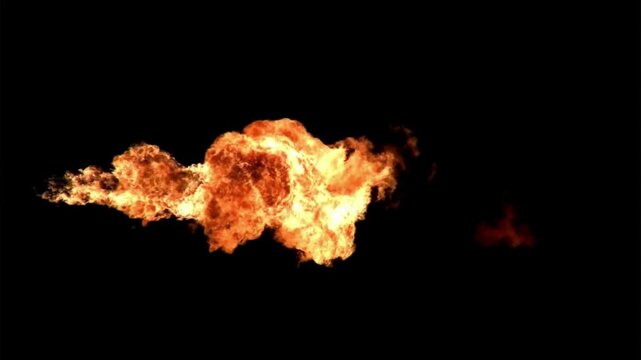 Horizontal flamethrower fire burst on black background