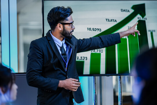 Sales director analyzing conversion funnel metrics on green bar chart. Marketing manager evaluating customer acquisition cost efficiency strategies.