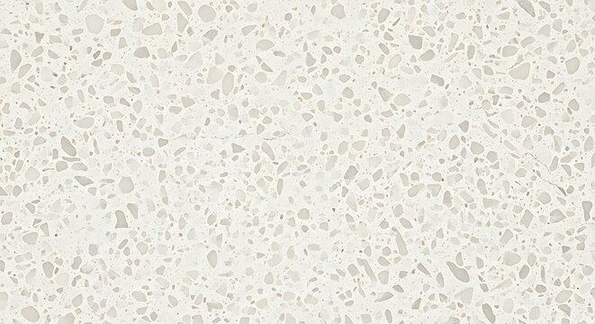 Seamless terrazzo pattern background with small white and grey chips on a light cream surface for interior design and construction materials