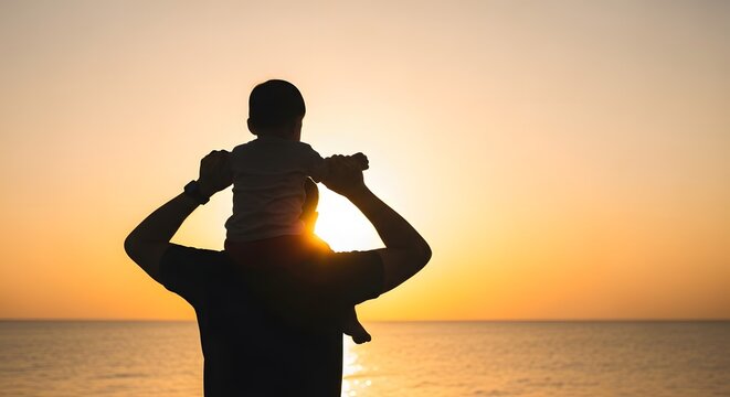 Heartwarming father's day silhouette dad carrying son at sunset