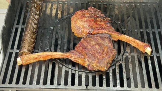 Cooking tomahawk steak on grill with fractal art in background and time-lapse of grilling process
