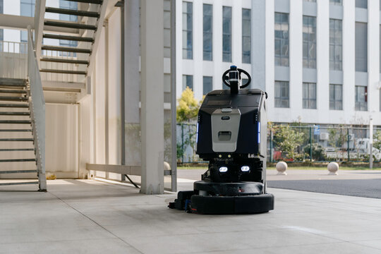 The robot vacuum is working in the mall