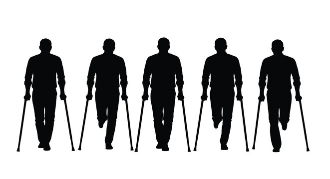 Five men walking with crutches a striking black silhouette