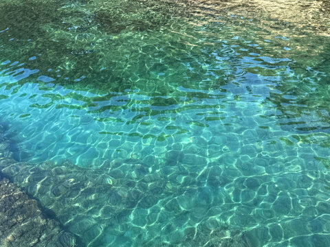 Clear turquoise sea calm water.