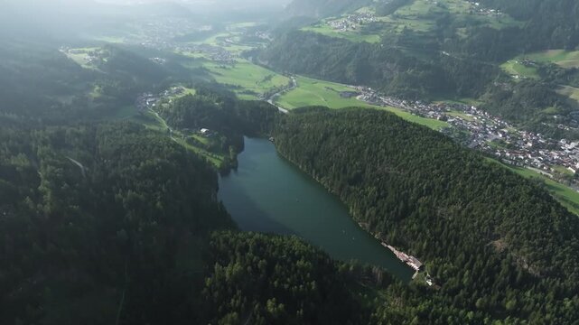 Aerial view of Piburger See Alpine lake in Tyrol Austria. Beautiful landscape of mountains nature.