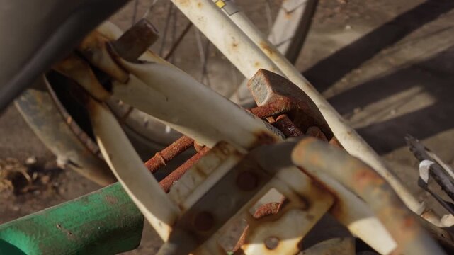 Detailed shot of aged bicycle featuring rust and weathering effects