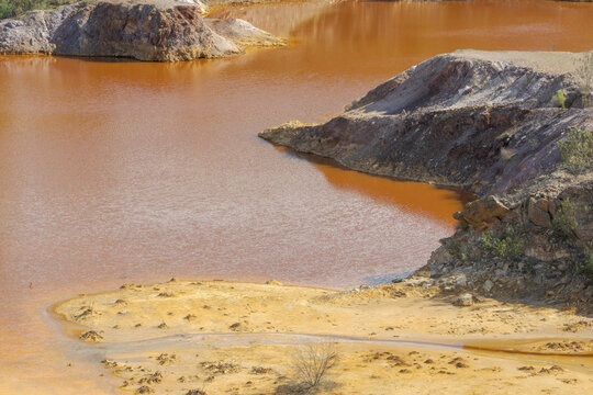 Lousal village mining pool showing industrial archaeology pollution