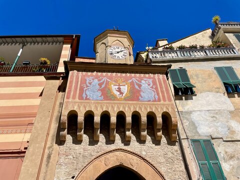 Ancient medieval gate Porta Testa in the historic center of Finalborgo, Italy.