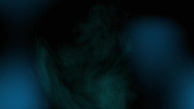 Blue smoke swirls in darkness. Abstract flow of motion in black background. Mysterious fog vapor effect for cinematic transition, artistic dark lighting concept