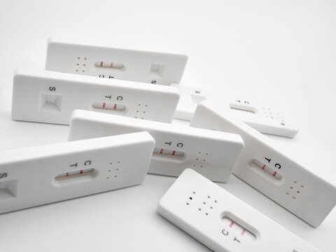 Multiple Positive Rapid Antigen Test Cassettes Lateral Flow COVID-19 Medical Testing And Health Concept