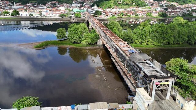 cachoeira, bahia, brazil - june 23, 2025: View of the iron bridge that connects the cities of Cachoeira and Sao Felix in Bahia.