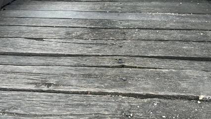Fototapeta premium Grey old wood texture made of natural polished boards. Horizontal slightly perspective view.