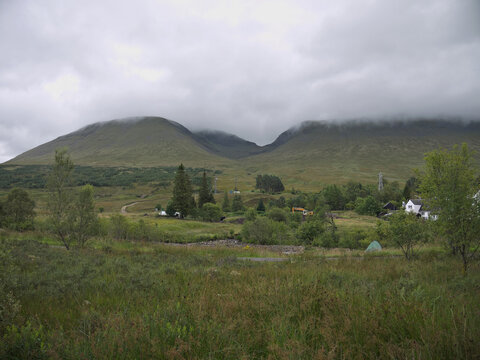 The view east from the West Highland Way north of Bridge of Orchy, to cloud capped Beinn an Dothaidh, Beinn Dorain and Coire an Dothaidh between them. Argyll, Scottish Highlands.