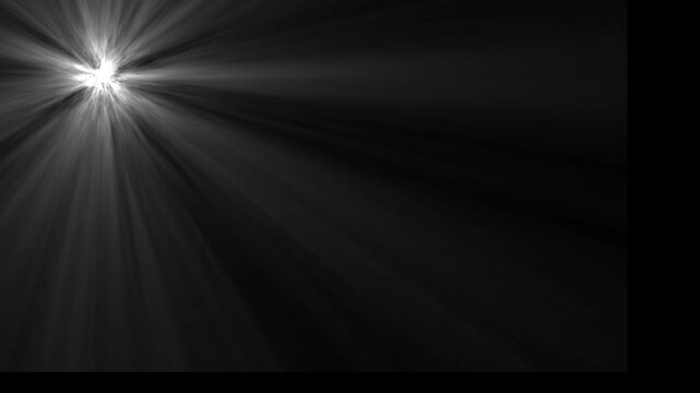 Bright white starburst light effect with radiating beams of light emanating from the upper left corner against a dark gray background with subtle gradient and vignetting effect