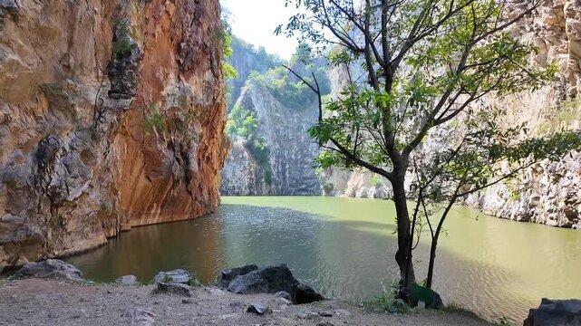 Scenic view of limestone canyon lake at Phu Pha Raet in Khao Ngu, Ratchaburi Thailand