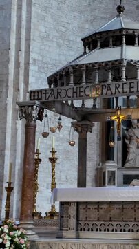 Basilica of San Nicola in Bari, view of the main altar with the sarcophagus of Queen Bona and figure of St. Nicholas, Bari, Puglia, Italy