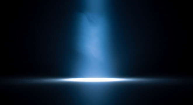 Spotlight on a dark stage with atmospheric smoke and bright light effects, creating a dramatic ambiance