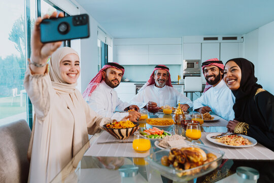 Arab family enjoying traditional meal together during ramadan