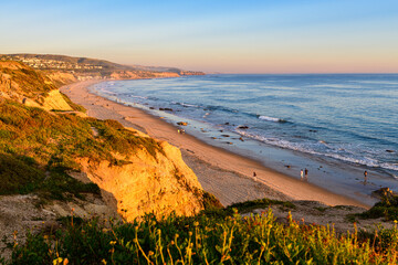 Golden hour sunlight hitting the cliffs at Crystal Cove State Park  © hong
