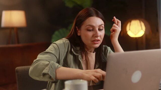 Woman Reacts on bad news Online. Individual Displays Confusion get notification and feeling upset reading bad negative news message On Laptop. High quality 4k footage