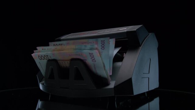 Money Counter Counting Ukrainian Hryvnia Bills