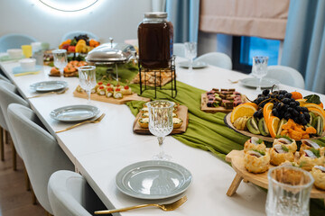 Fototapeta premium Elegant Meal Setting. Charming Breakfast Table Arrangement. Intimate Outdoor Style Dining Scene Described. Sophisticated Brunch Display With Fine Tableware And Natural Light