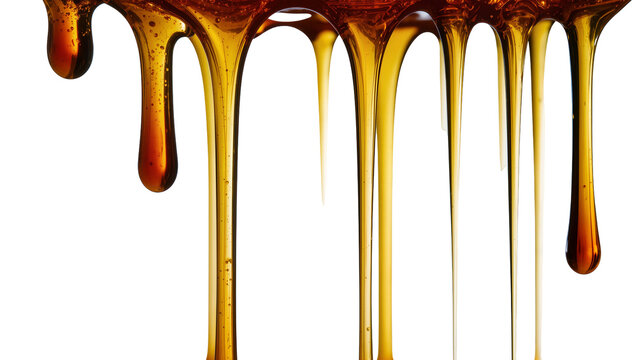Thick golden honey dripping in strands, isolated on transparent background