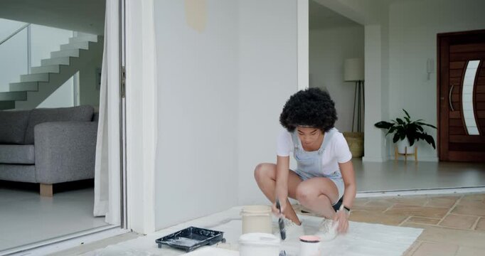Checking chips and cans African woman in overalls testing swatch picking hue at entry, copy space