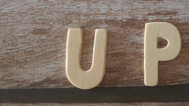 wooden letters text up