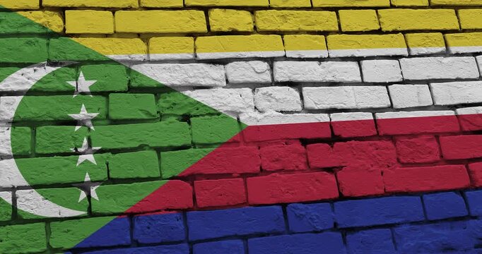 A panning video of a brick wall with the comoros flag