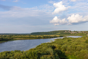Obraz premium Scenic view of river and lush greenery in Sovetsk, Kirov region, Russia