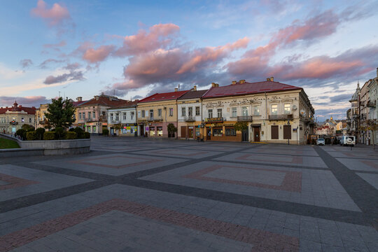 Historical Market Square buildings in Drohobych at sunset
