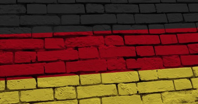 A panning video of a brick wall with the germany flag