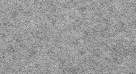 Fototapeta premium Flat lay texture of grey felt fabric showing a dense, non-woven fibrous surface.
