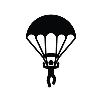 Black silhouette of a person parachuting, parachute open skydiving