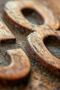 A close-up shot of a wooden table with a single number. vertical frame
