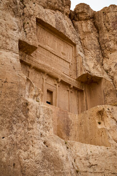Ancient tomb carved in rock in Naqsh-e Rostam near Persepolis, Iran