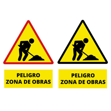 Peligro zona de obras yellow signs isolated on a white background (trad. danger men at work)