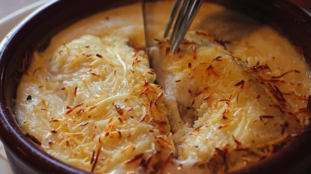 Canelones with beef, cheese and bechamel sauce in an Italian restaurant.
