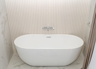 Fototapeta premium White bathroom with modern fixtures