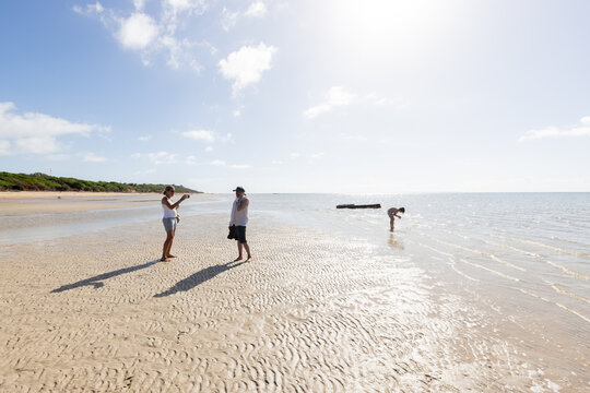 family exploring beach, Vilankulos, Mozambique, Africa