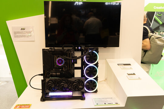 Gaming PC setup with liquid cooling system display