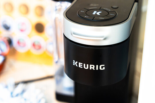Close‑up of Keurig single coffee maker logo on machine in a home, Lafayette, Indiana, January 2026