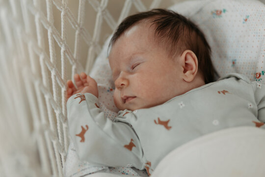 Peaceful sleep of a sweet newborn baby girl